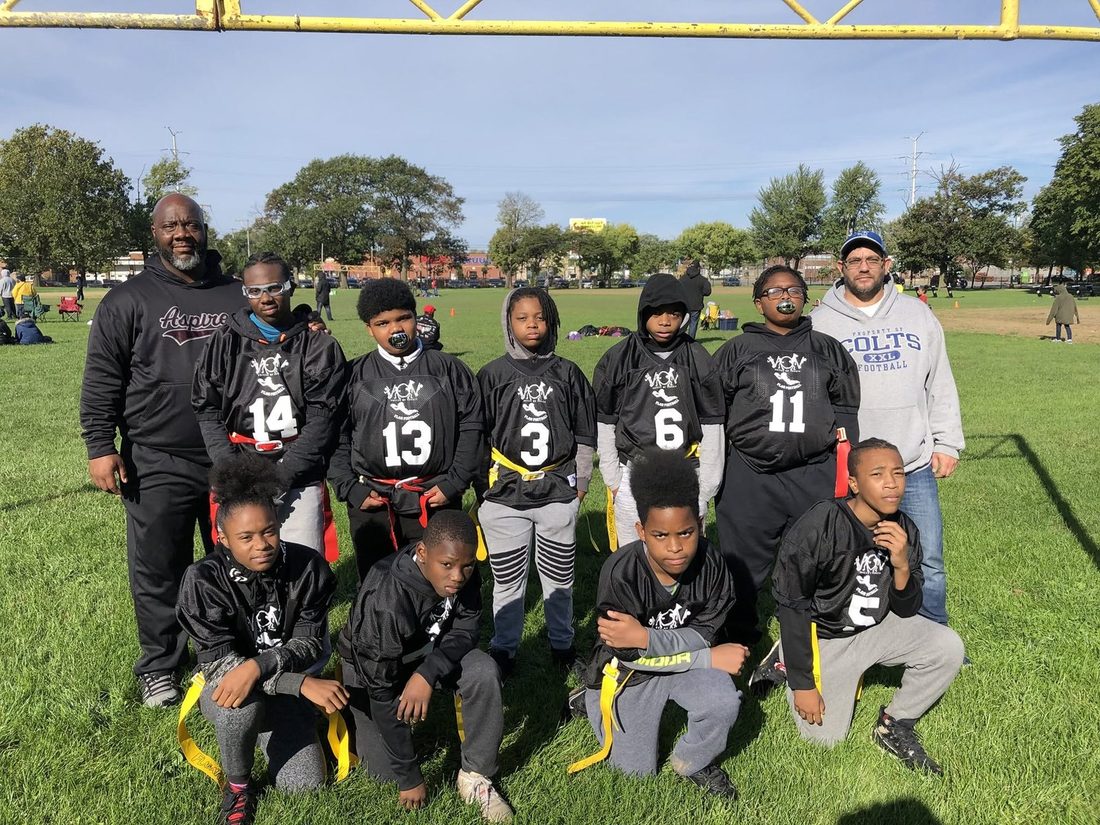 V.O.V flag football team in black jerseys