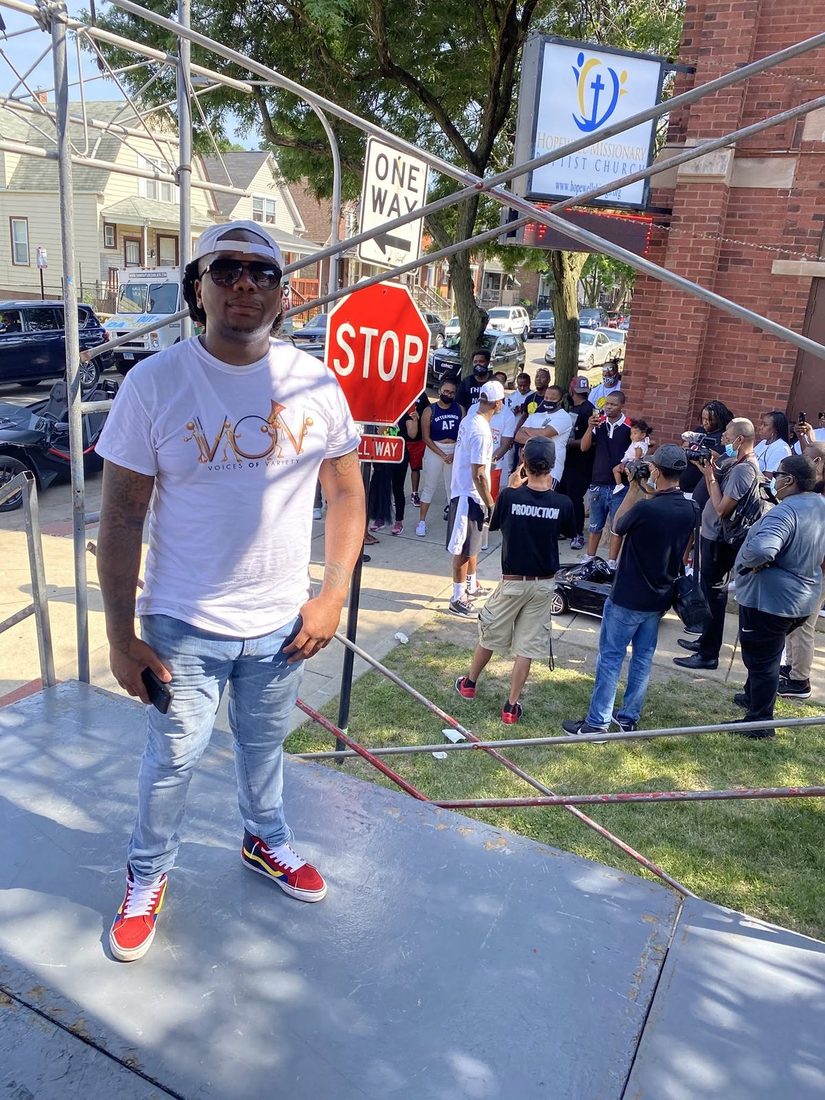 The V.O.V tee out in the community at a stop-the-violence event