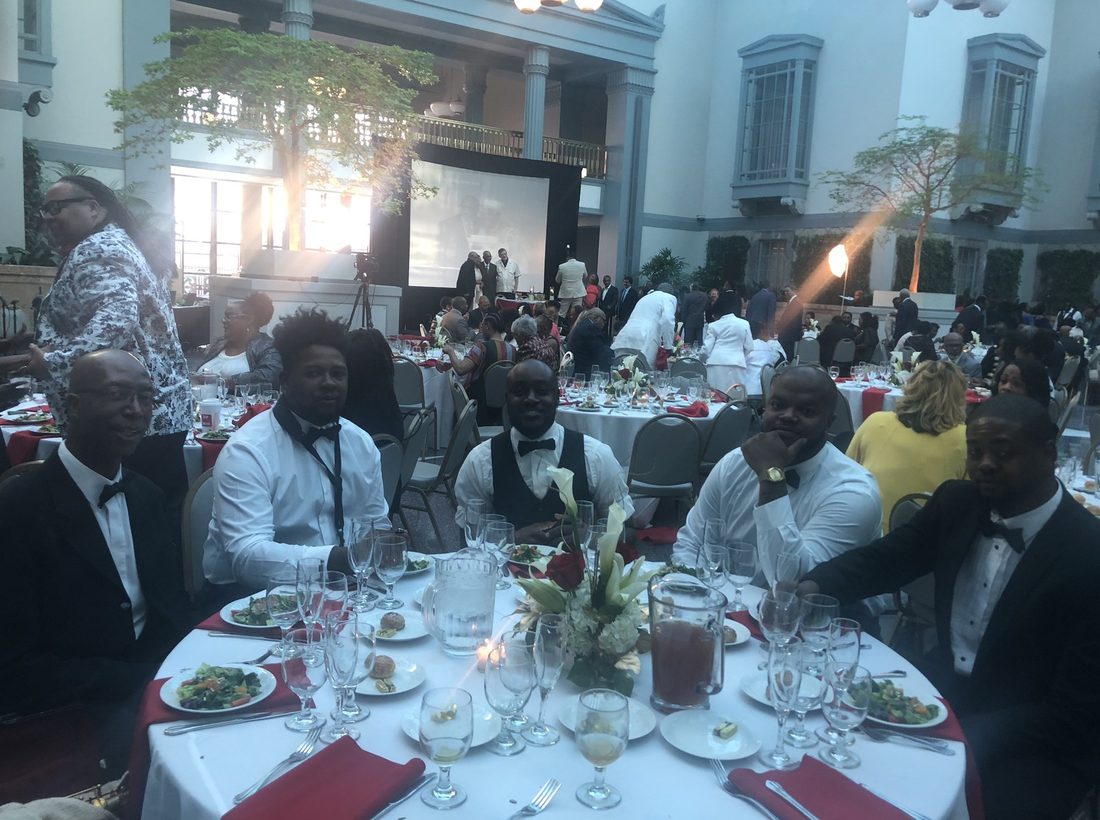 Guests in formal attire at the V.O.V gala banquet