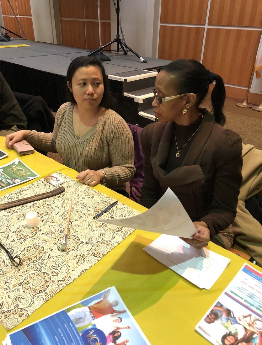 V.O.V program information table at a community event