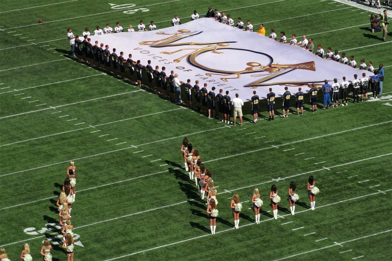 The V.O.V flag on a college field &mdash; dream that big