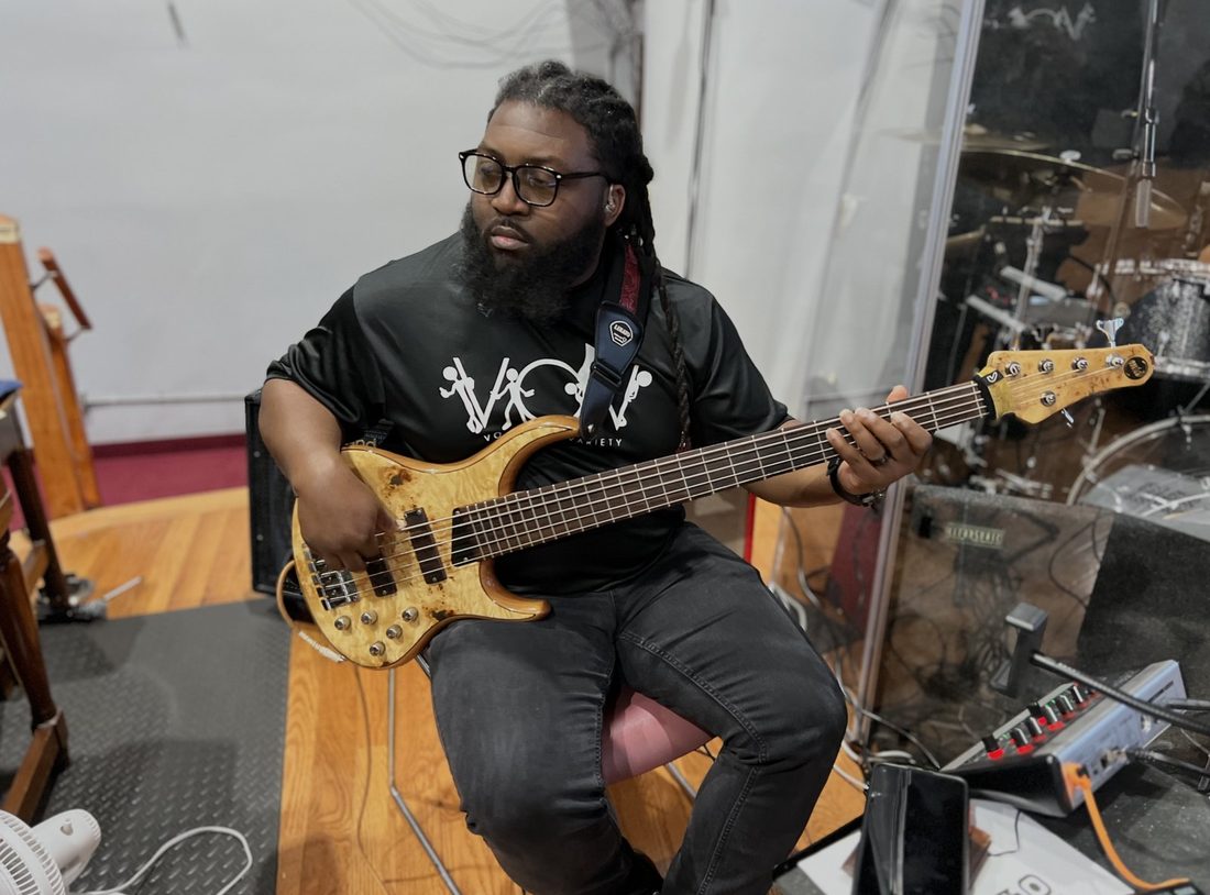 A V.O.V bassist playing in the sanctuary