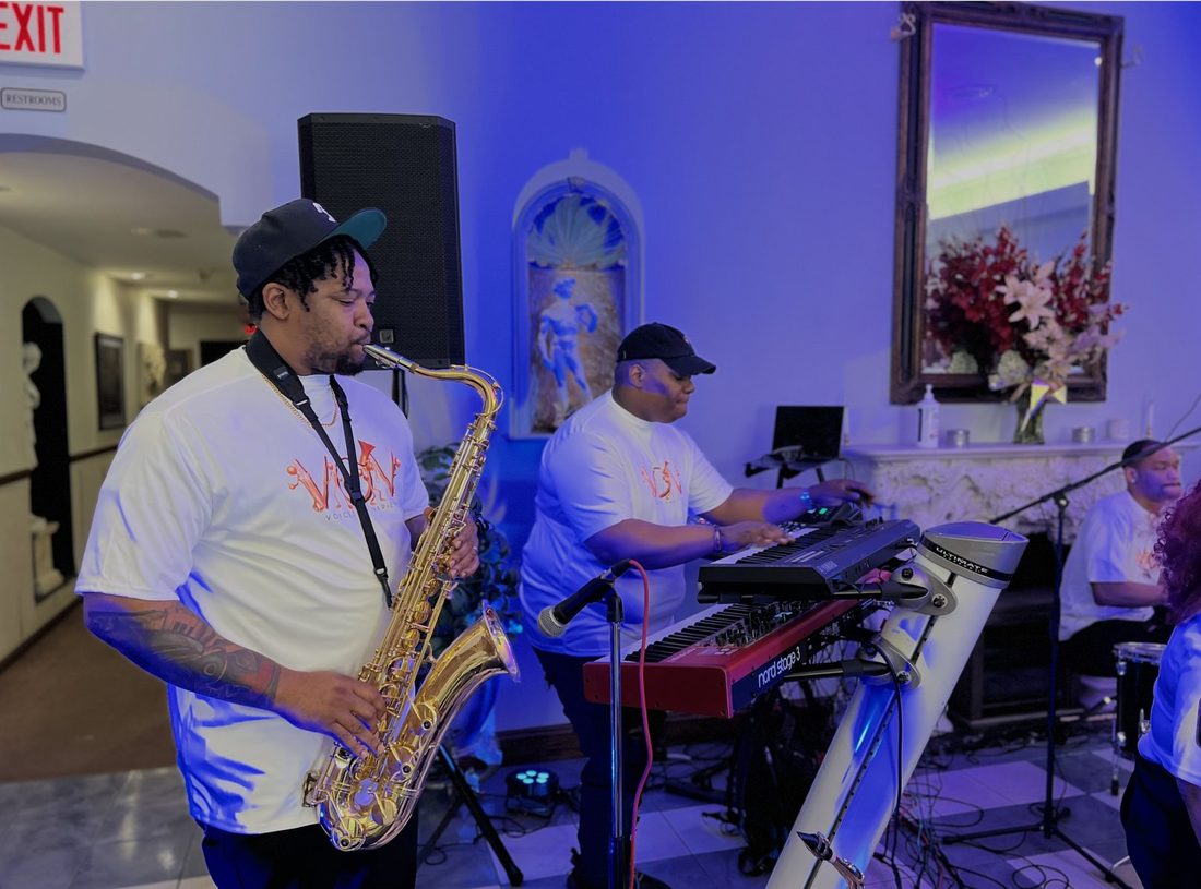 The V.O.V saxophone and keys players mid-song