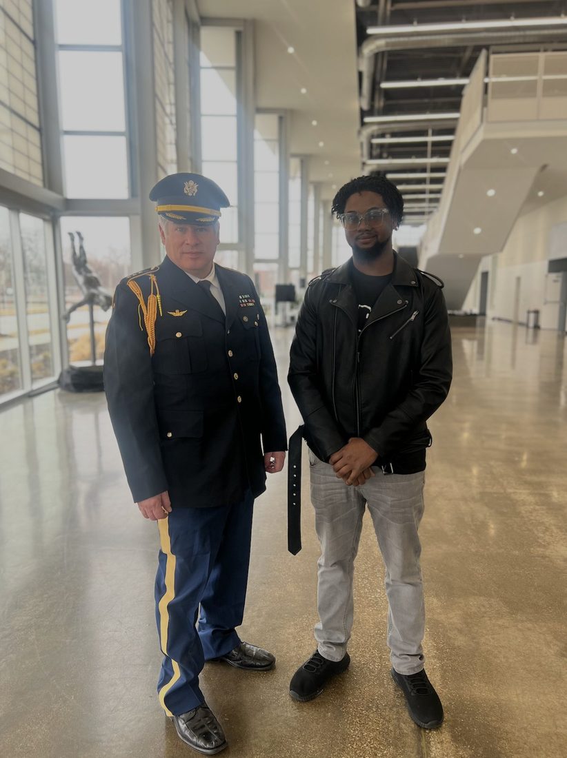 A V.O.V member with an honor guard officer at a veterans event