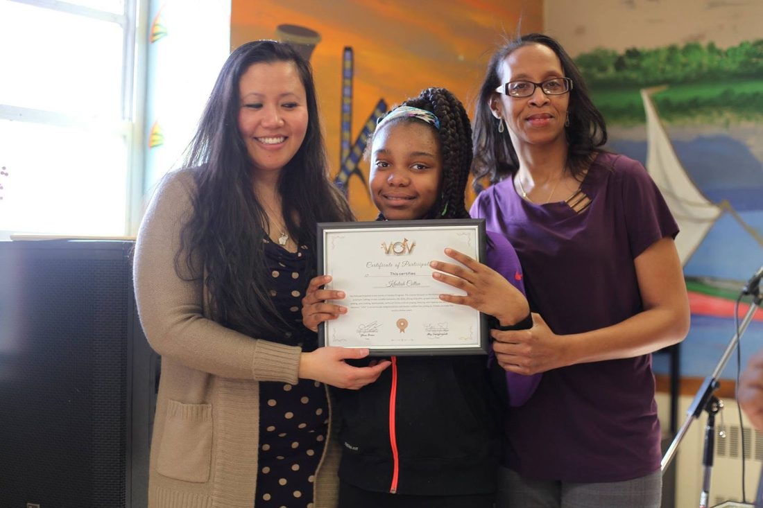 Khaliah's big moment - certificate in hand