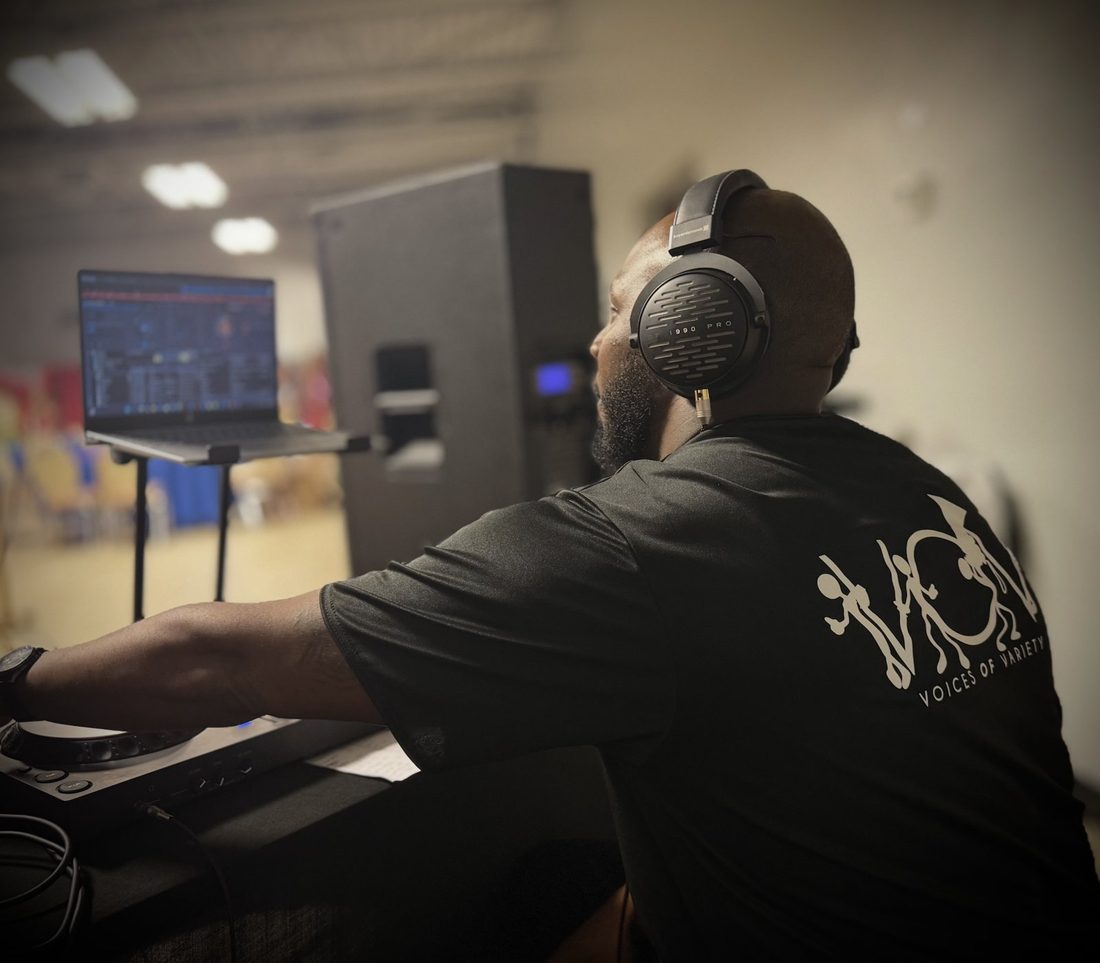 A V.O.V DJ mixing at a community event