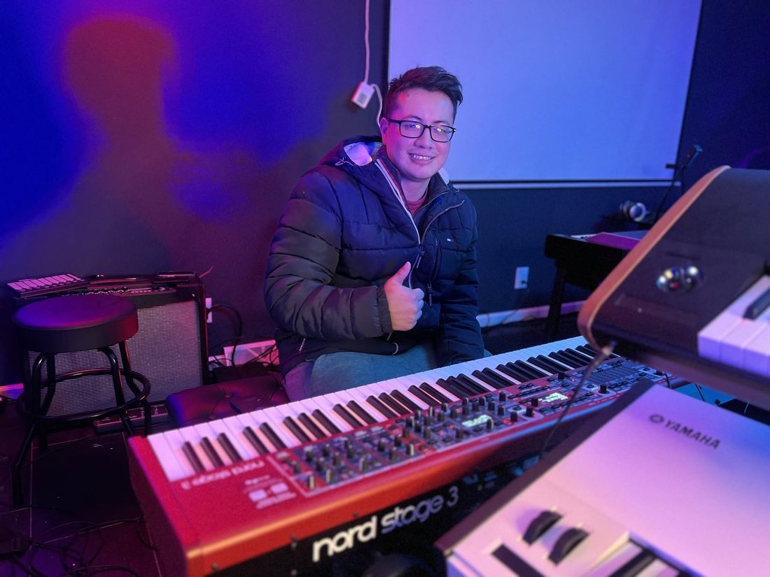 A V.O.V keyboard player at a Nord Stage in the studio