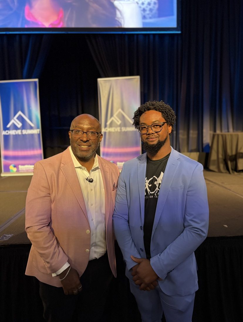 Two V.O.V leaders suited up at a leadership summit