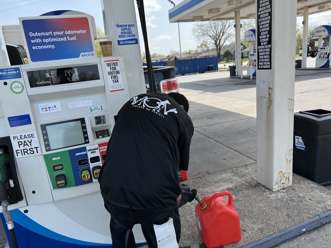 A V.O.V member on a fuel run at the gas station