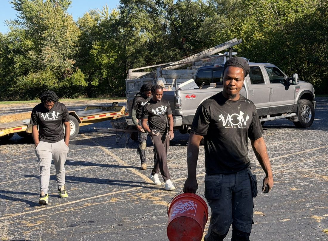 The V.O.V work crew hauling buckets on a job site