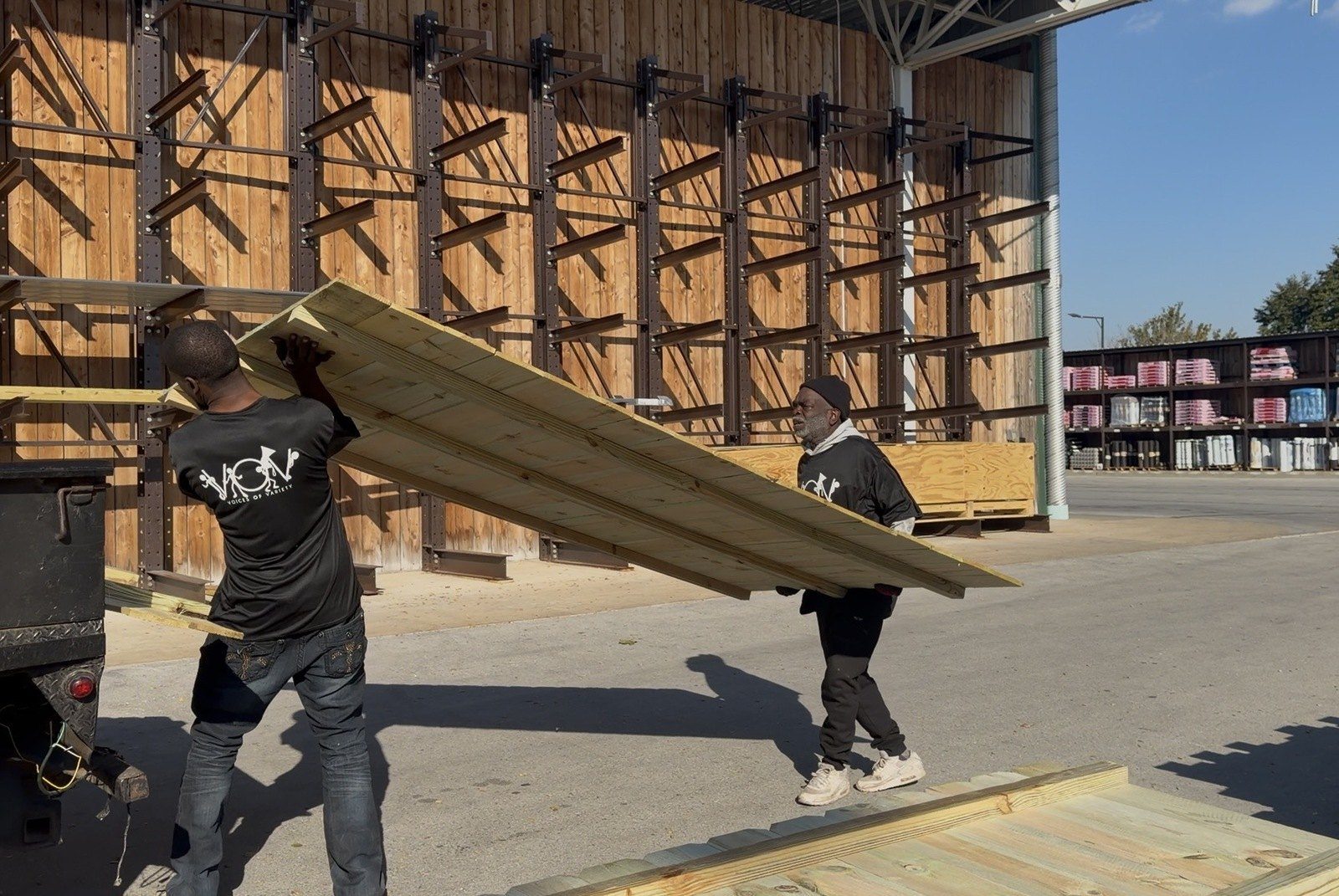 V.O.V members working hands-on at a real lumberyard