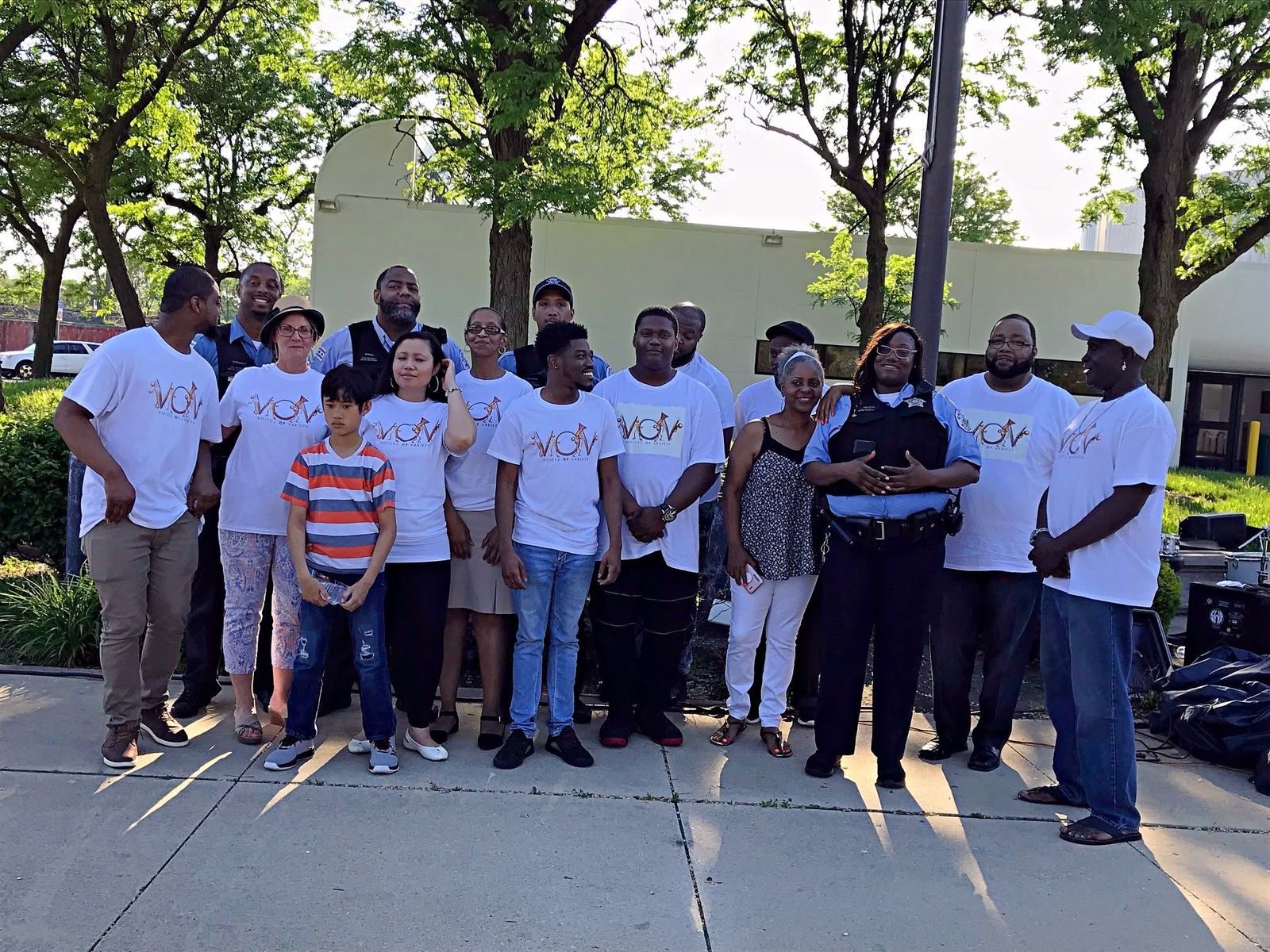 V.O.V volunteers gathered together in matching shirts