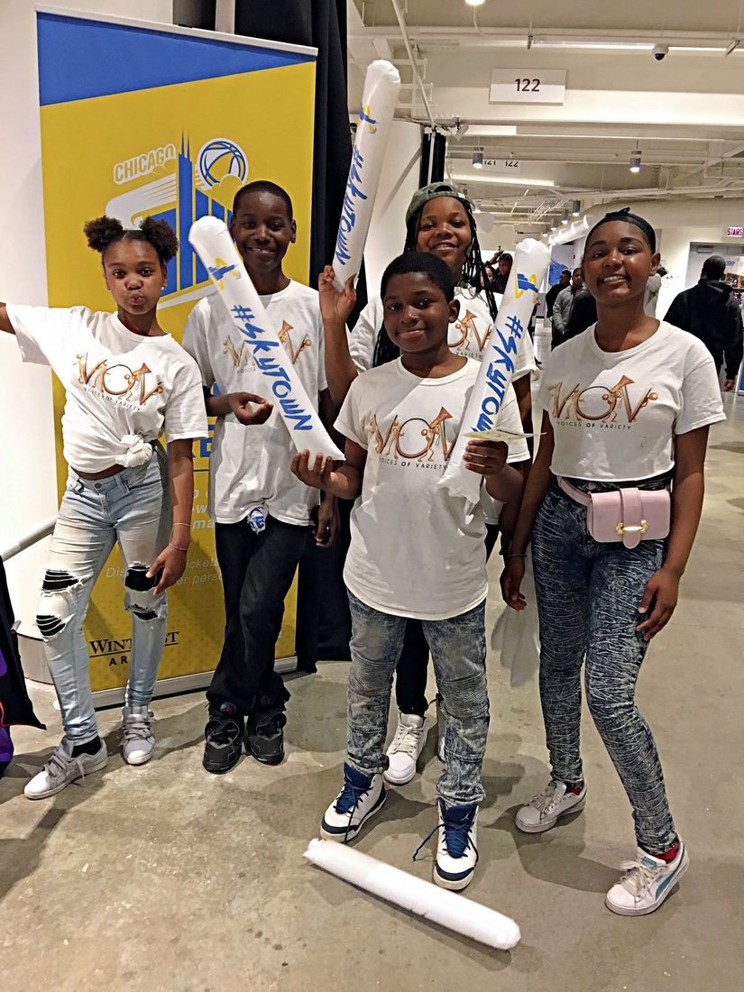 Young people gathered at a V.O.V community event
